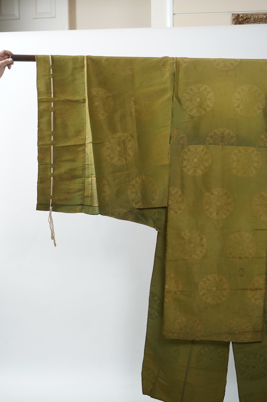 Two 1880-1920 Japanese green silk damask Kariginu, ‘hunting cloth’ robes, worn not as ‘hunting robes’ at this period, but as day wear for high ranking male Imperial Court nobles, traditionally worn with a sash at the wai